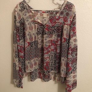 This is a Ariat sheer blouse in size large .